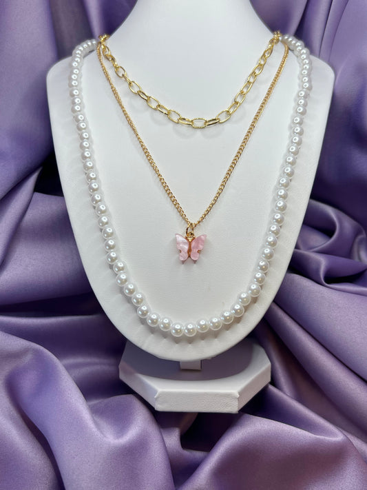 Collier papillon rose